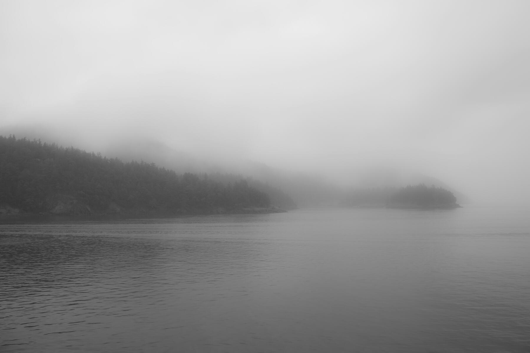 Misty coastal islands.